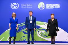 UK’s Foreign Secretary Liz Truss and Executive Secretary of United Nations Framework Convention on Climate Change Patricia Espinosa greet Kazakh Prime Minister Askar Mamin at the Leaders Summit of the 26th UN Climate Change Conference in Glasgow on Nov.1. Photo credit: Karwai Tang/ UK Government