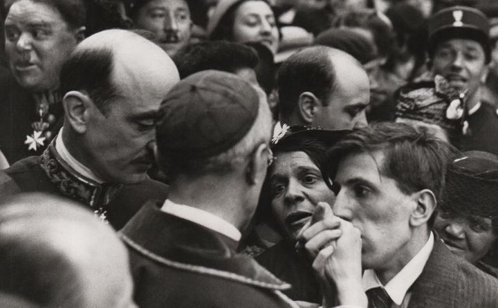 HENRI CARTIER-BRESSON , The Visit of Cardinale Pacelli a Montmartre, Paris, 1938, The Møller Collection. © Magnum Photos.