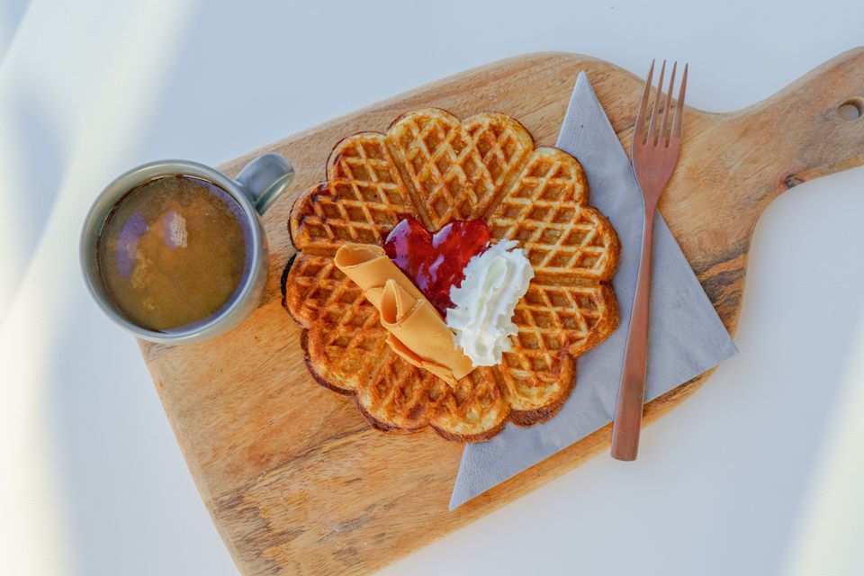 BrimExplorer_Waffle with brown cheese and jam on a board
