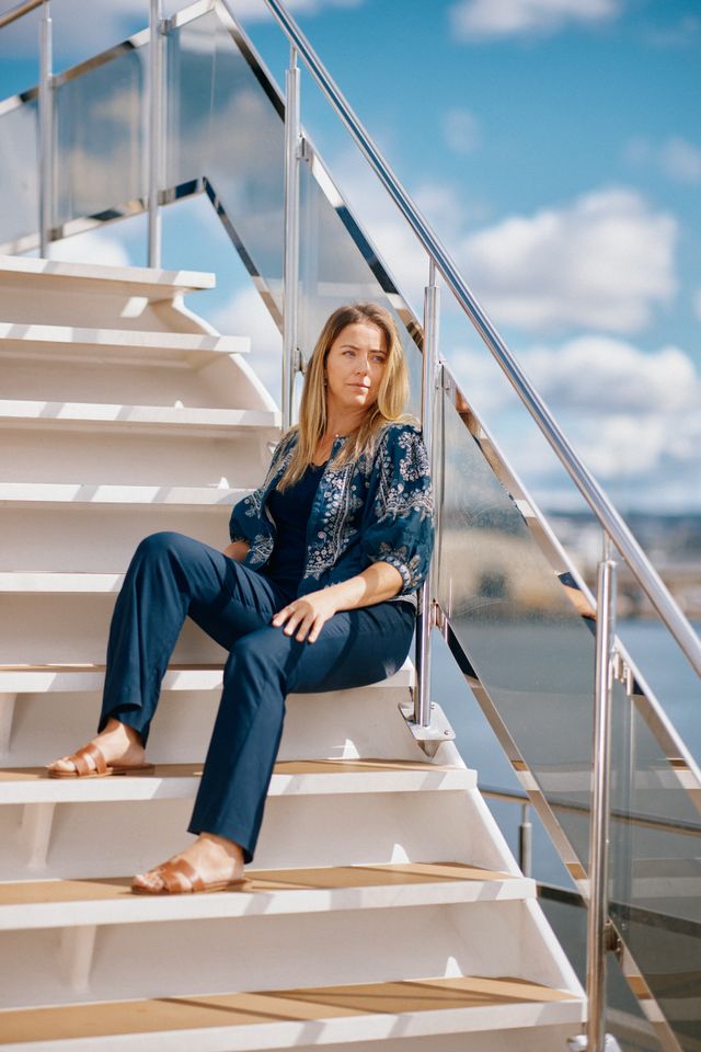 Brim Explorer_founder_Agnes sitting on stair_photocredit_StudioAbrakadabra