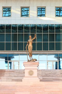 Statue at the entrance to the Supreme Court of Kazakhstan (Depositphotos)