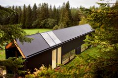 Langhuset er blitt et prektigt bygg i skogen i Stjørdal. Foto: Glen Musk