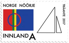 NK 1952: Det samiske flagget og en stilisert tegning av Sametingsbygningen.