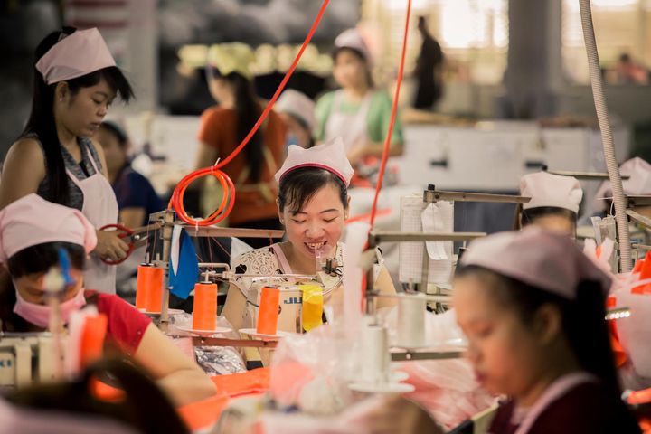 Female Workers in Pro Kingtex Factory, a textile factory located inside Pou Yuen industrial zone, Tan Binh District, Ho Chi Minh City. Only 24 per cent of babies under 6 months are exclusively breastfed in Viet Nam, and only 22 per cent are breastfed until two years. These rates are likely to be lower among factory workers, who typically wean their babies early, replacing the breast milk with formula due to concerns and uncertainty about their ability to breastfeed once they are back to work in the factory after maternity leave. Photo: UNICEF UN0215795 / Truong Viet Hung