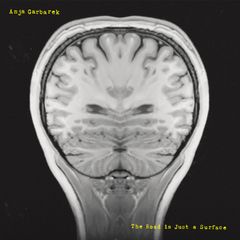 Artwork for den gule utgaven av "The Road Is Just a Surface"