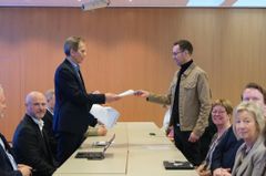 Magne Kristensen fra NHO Reiseliv og Clas Delp fra Fellesforbundet