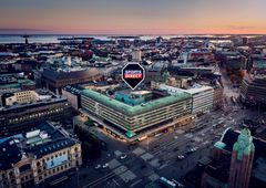 Aerial view of Helsinki Citycenter Mall with the Sports Direct logo highlighted on the building.