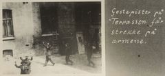 Foto med teksten "Gestapister på Terrassen får strekke på armene." Ukjent fotograf/Nasjonalarkivet, CC BY-NC.