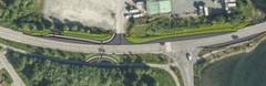Bildet er en illustrasjon som viser hvordan krysset til båthavna blir seende ut når nye holdeplasser og passeringslomme er på plass. Tiltaket skal bedre trafikksikkerheten og flyten i trafikken på denne delen av E8 i Tromsdalen.