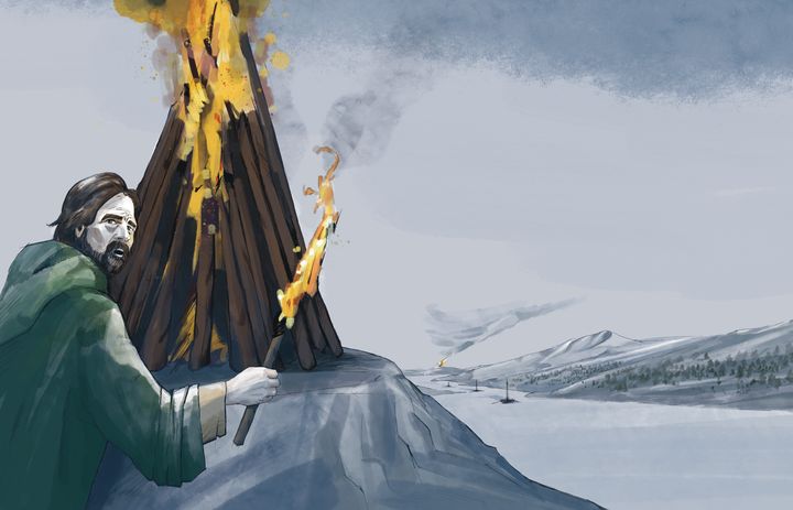 Mann kledd som viking antenner en vete.
