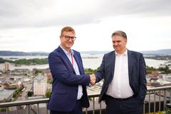 Arne Erik Berntzen i Posten Bring og Odd Inge Bjordal i Sopra Steria