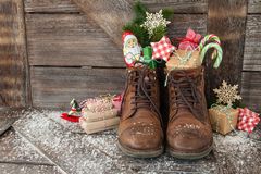 Germany: Brown leather boots with gifts and sweets