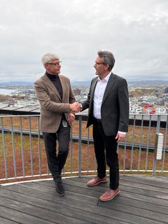 Generalsekretær i Huseierne, Morten Andreas Meyer og Erik Tønnesen, administrerende direktør i Optimera