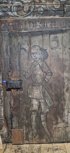 Maleri av en mann i 1700-talls uniform og med våpen i hånda.