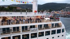 Passengers and crew has a wave off from Bergen on the maiden voyage of Havila Pollux.