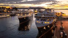 Havila Polaris back out of Vågen in Bergen for her maiden voyage, passing her sister ship Havila Pollux.