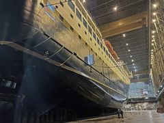 Havila Capella in dock at Westcon shipyard in Florø, Norway. CEO Bent Martini and chairman of the board, Per Sævik, inspects the ship.