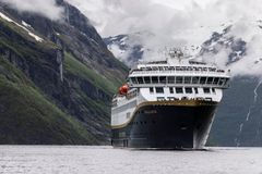 Havila Castor in the Geirangerfjord. 2nd of June 2022, Havila Castor was the first cruise ship to sail into the world heritage fjord, the Geirangerfjord, on battery, emission-free. .