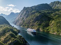 A ship from Havila Voyages in the Trollfjord.
