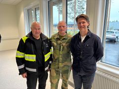 Teambilde av tre menn