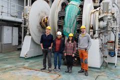 Paul Dodd (Norsk Polarinstitutt), Anette Wold (NP), Arunima Sen (UNIS) og Marven Muilwijk (NP) på akterdekk foran trålvinsjene.