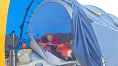 Mina Floriana enjoys herself in the tent during a stage over the Vatnajökullen glacier in Iceland in 2025.