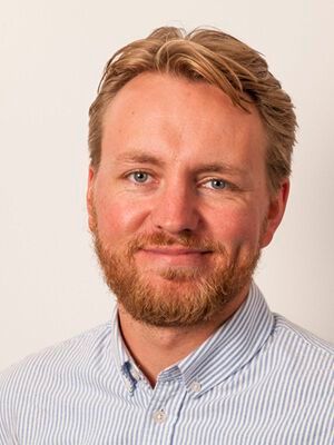 portrett av smilende mann